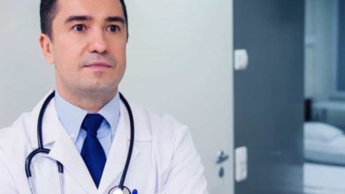 Doctor in a white coat at hospital