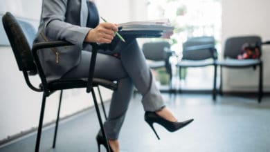 Woman passes interview in office, head hunting